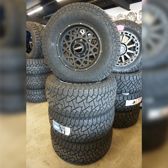 Vision Wheels Rocker 412 Satin Black 18x9 12mm Offset 8x170 Gladiator Tires XComp A/T 35x12.50R18 E Wheel And Tire Package