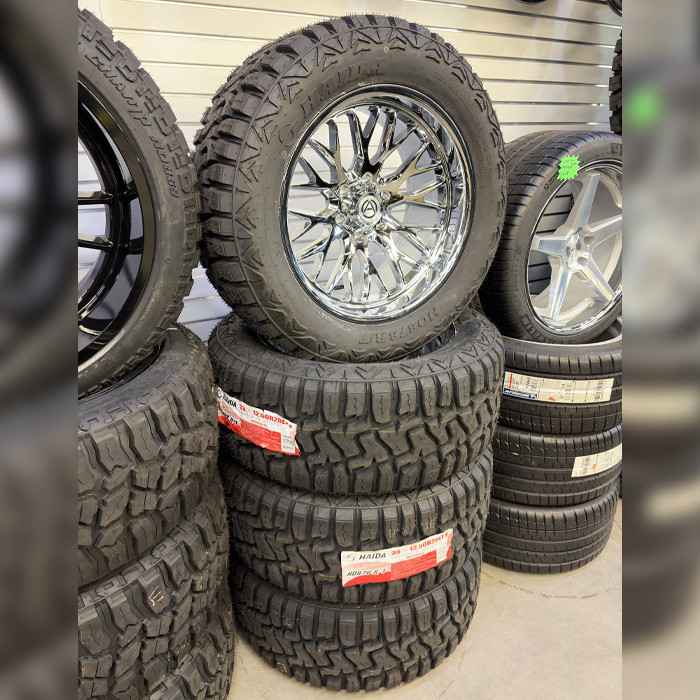 Artem Offroad Wheels Novus A206 Chrome 20x10 -19mm Offset 6x139.7 (6x5.5) Haida Tires HD878 Rugged Terrain R/T 33x12.50R20 E Wheel And Tire Package